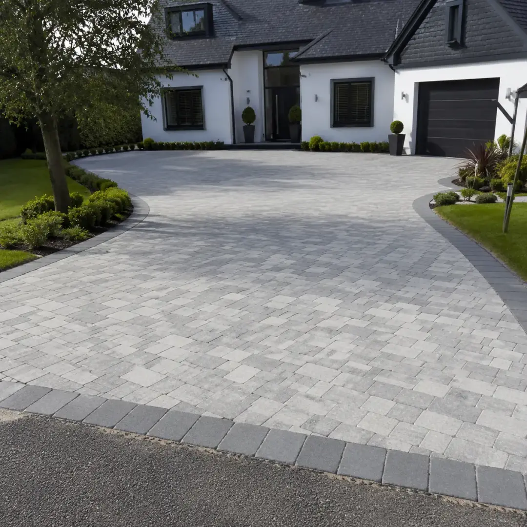 Driveway laying with clean edging and landscaped frontage